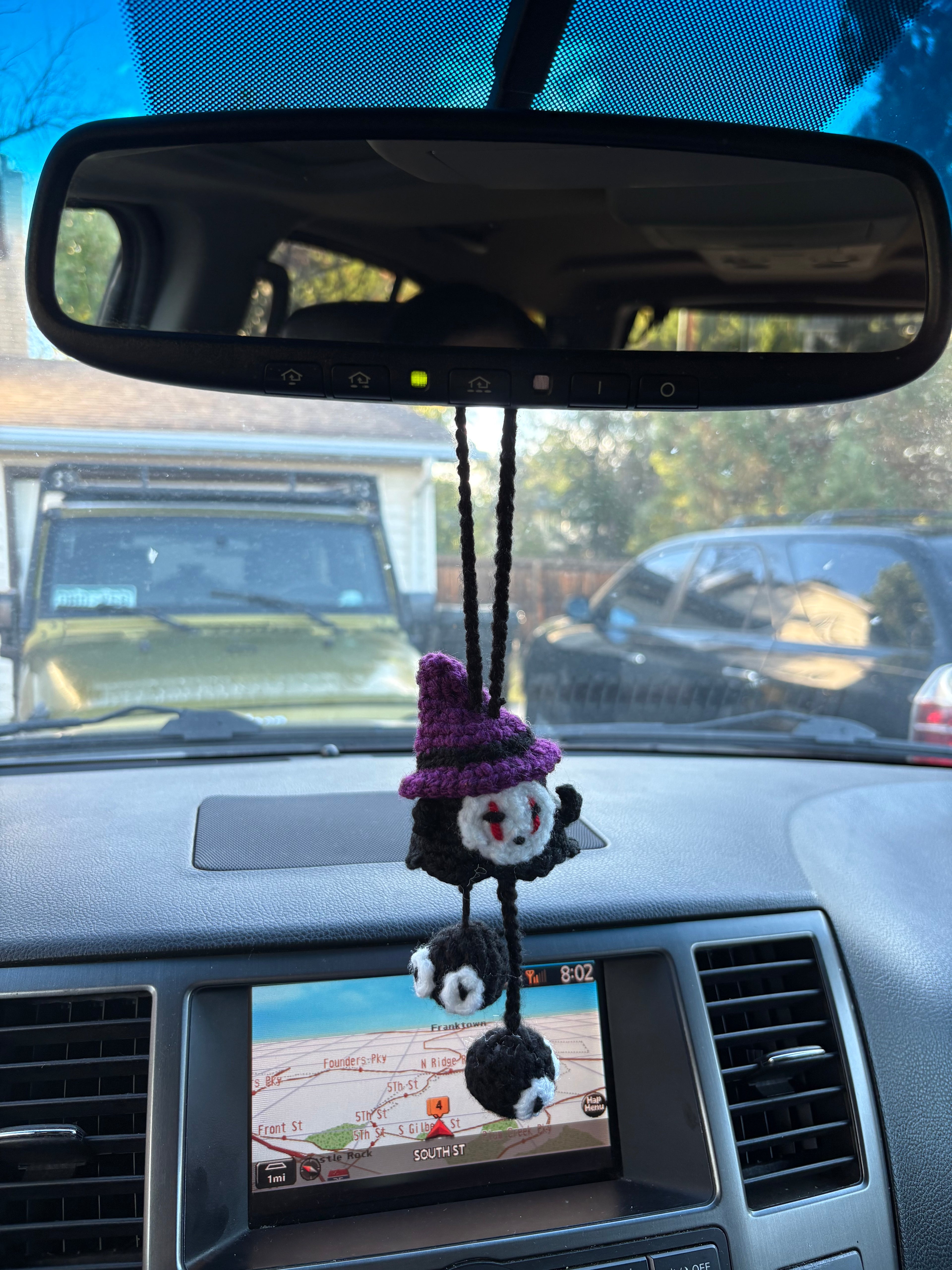 Faceless ghost car hanger