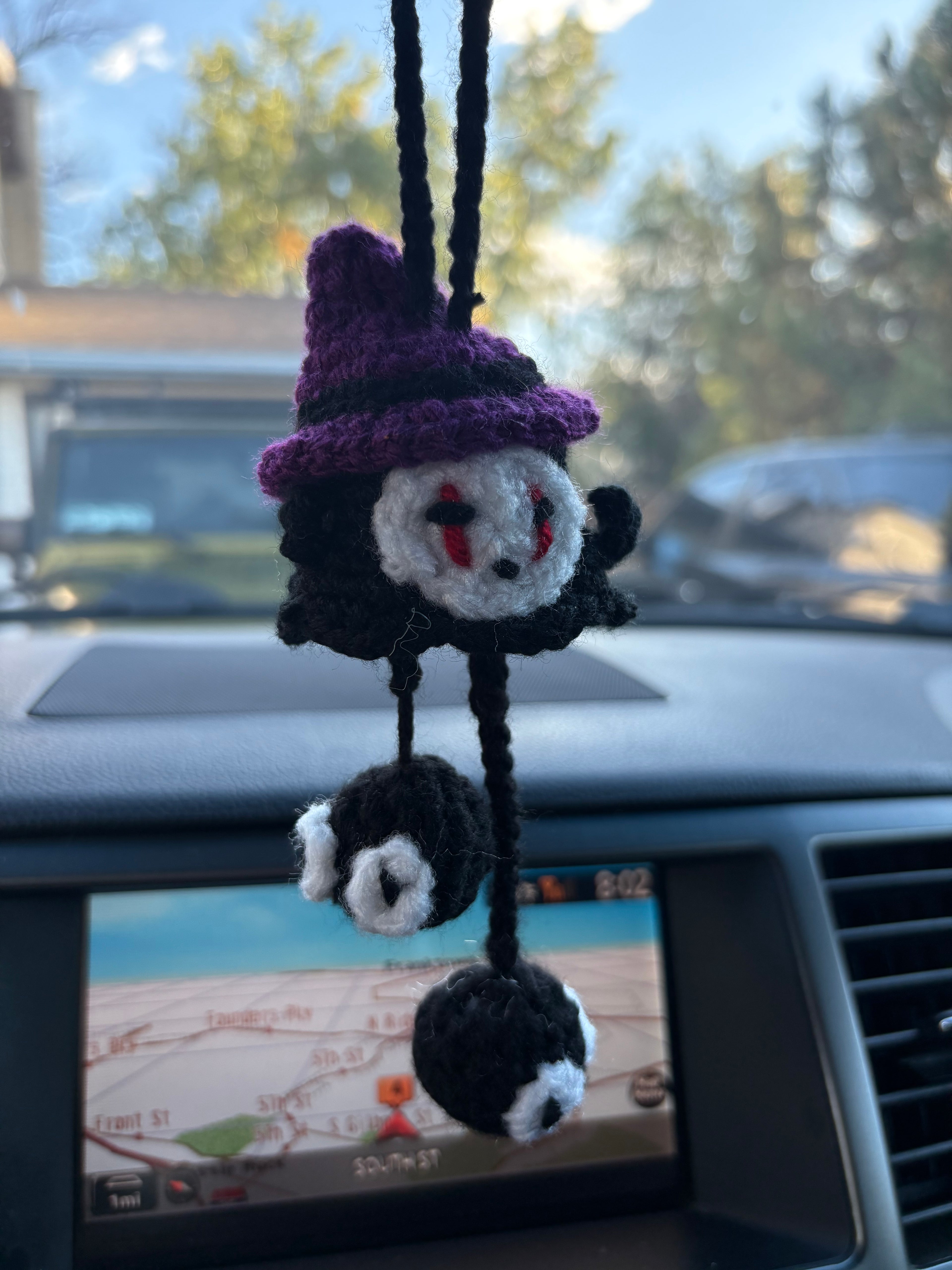 Faceless ghost car hanger